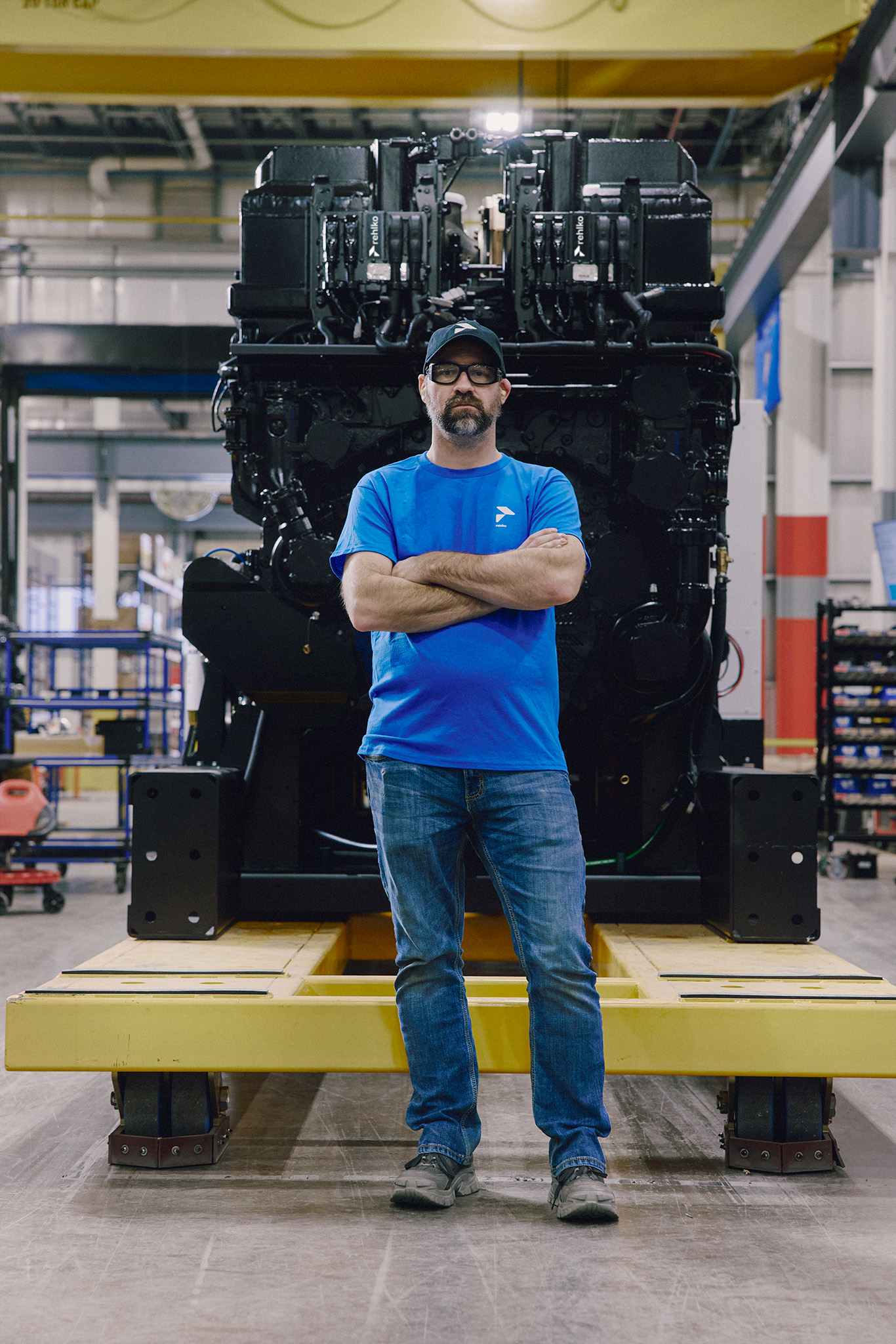 Man in front of Rehlko generator
